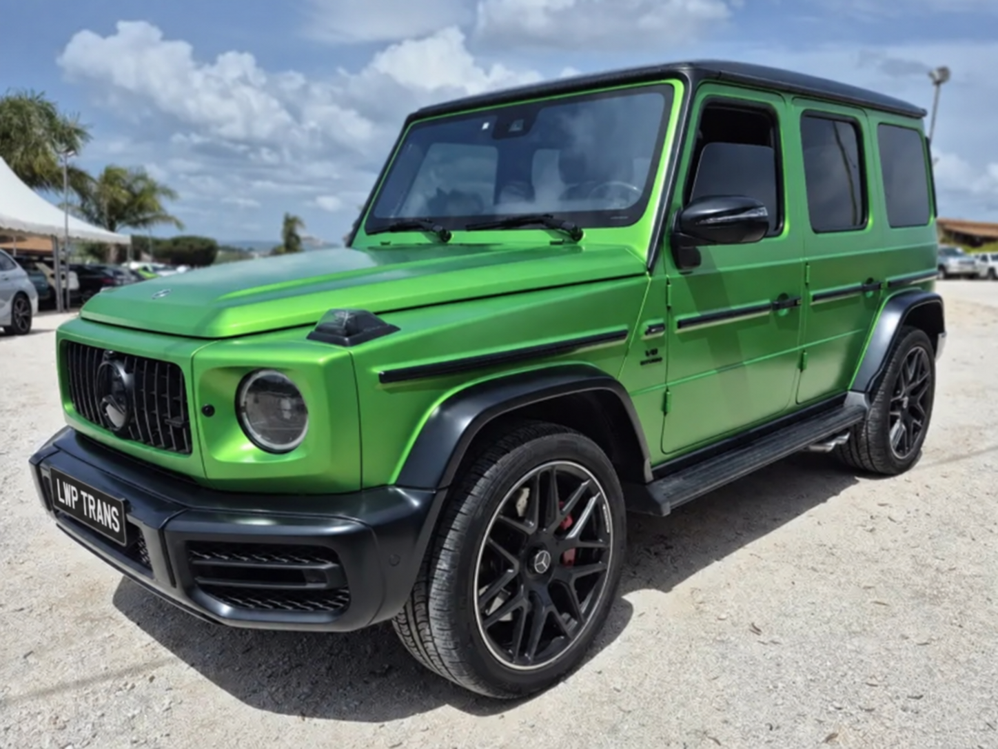 Green Mercedes-Benz G-Class, front three-quarter view